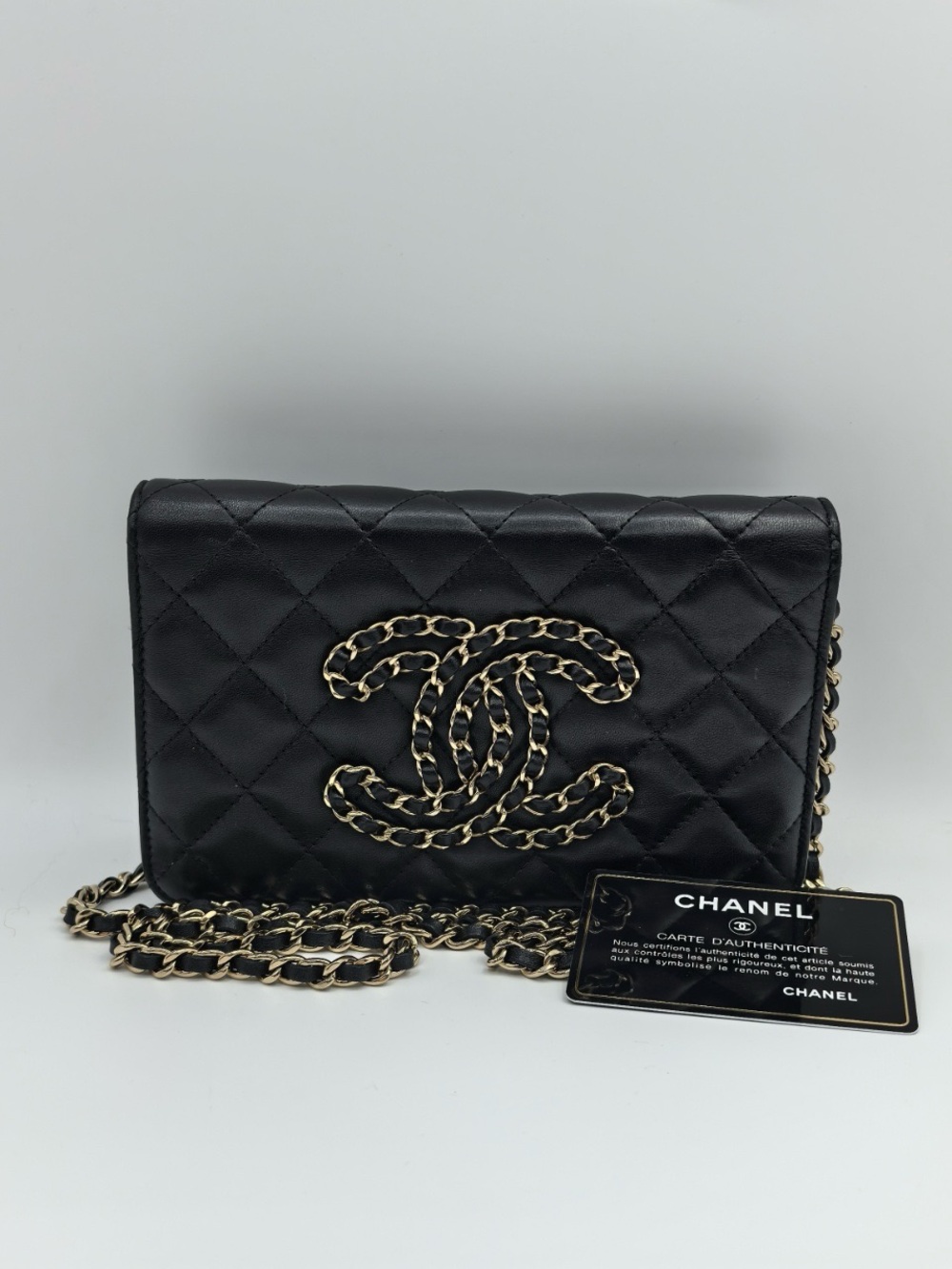 Chanel Wallet on Chain WOC in black lambskin gold-tone hardware with black card